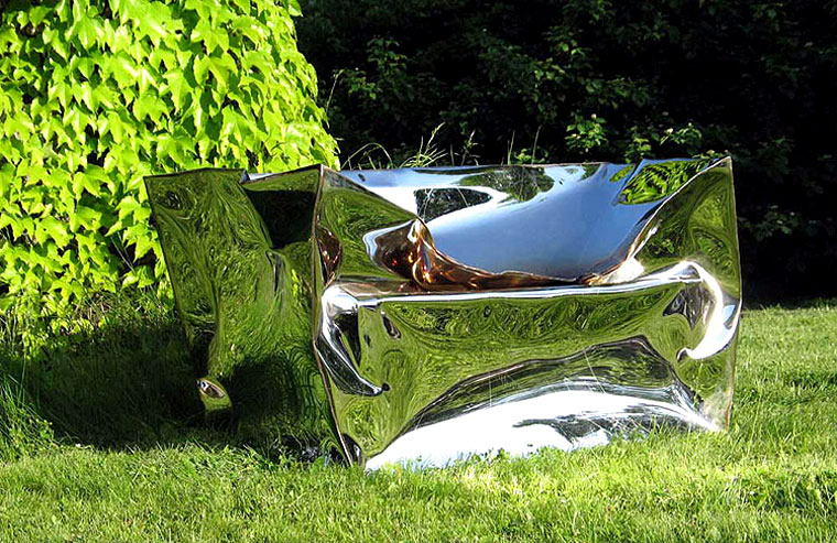 Garden sculpture of mirror polished stainless steel.